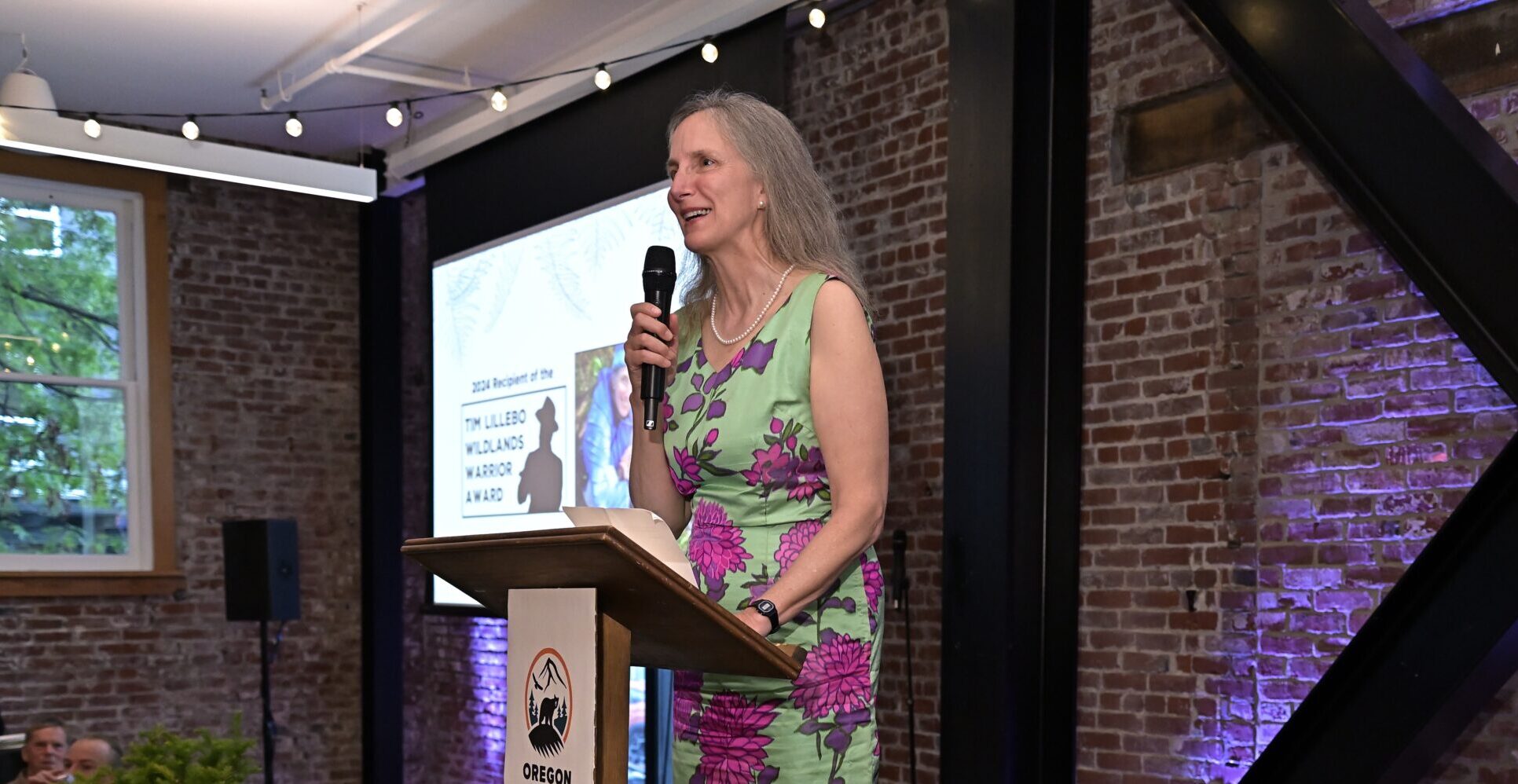 Ann Vileisis accepting the Tim Lillebo Wildlands Warrior Award at the Oregon Wild 50th Anniversary Gala